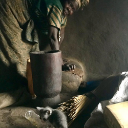A friend in Amuru, Northern Uganda teaches me to grind sesame butter. Her village has several grinding machines, but she prefers to use her grandmother’s stone ' January 2021 A friend in Amuru, Northern Uganda teaches me to grind sesame butter. Her village has several grinding machines, but she prefers to use her grandmother’s stone ' January 2021